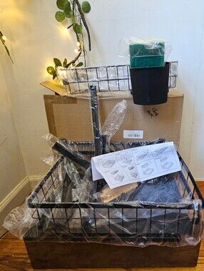 Black nib metal two-tier wire basket organizer. A smaller wire basket stacked se